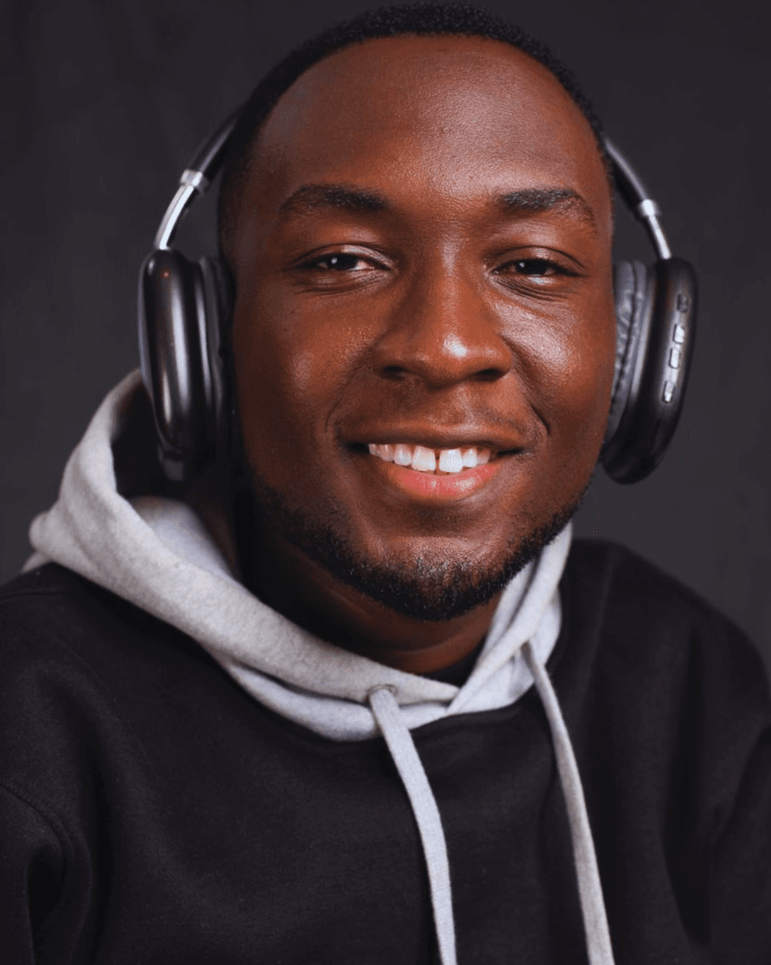 Emmanuel wearing headphones